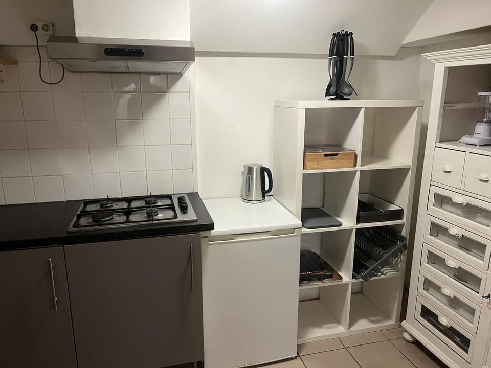 Kitchen or kitchenette, oven, stove