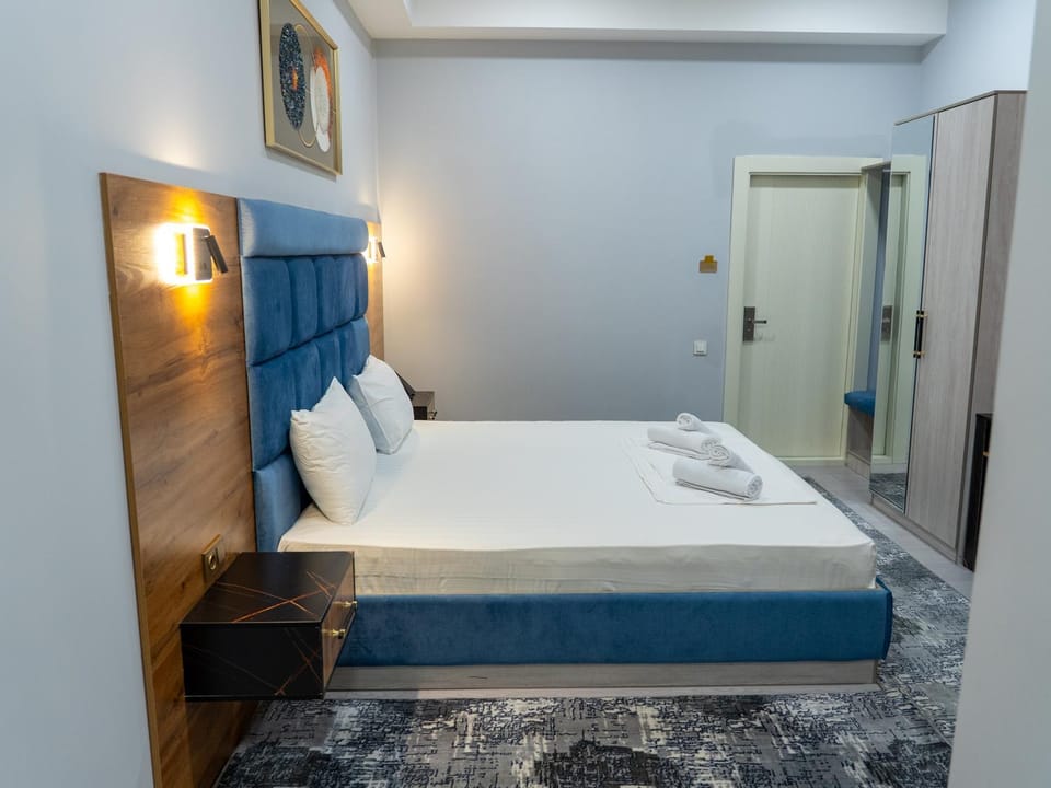 Bed, Photo of the whole room, Bedroom, towels, wardrobe