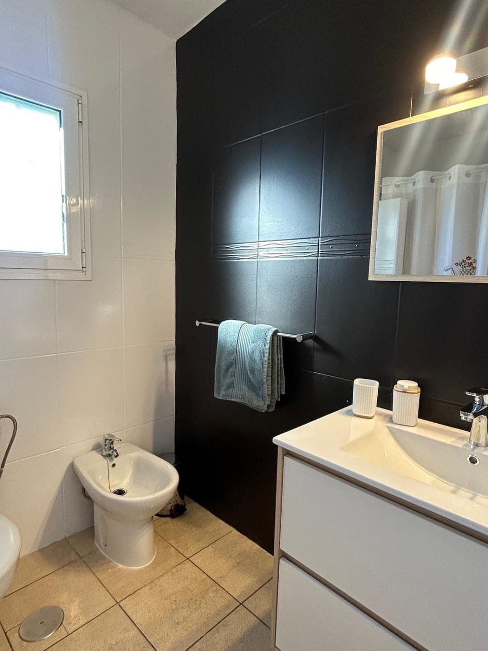 Bathroom, bidet, towels