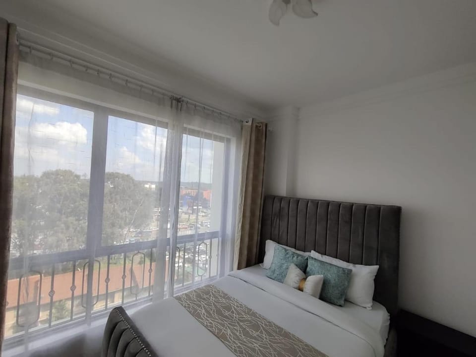 charming urban retreat apartment with private parking,fully equipped gym ,children playing ground and unbeatable city views Apartment in Nairobi