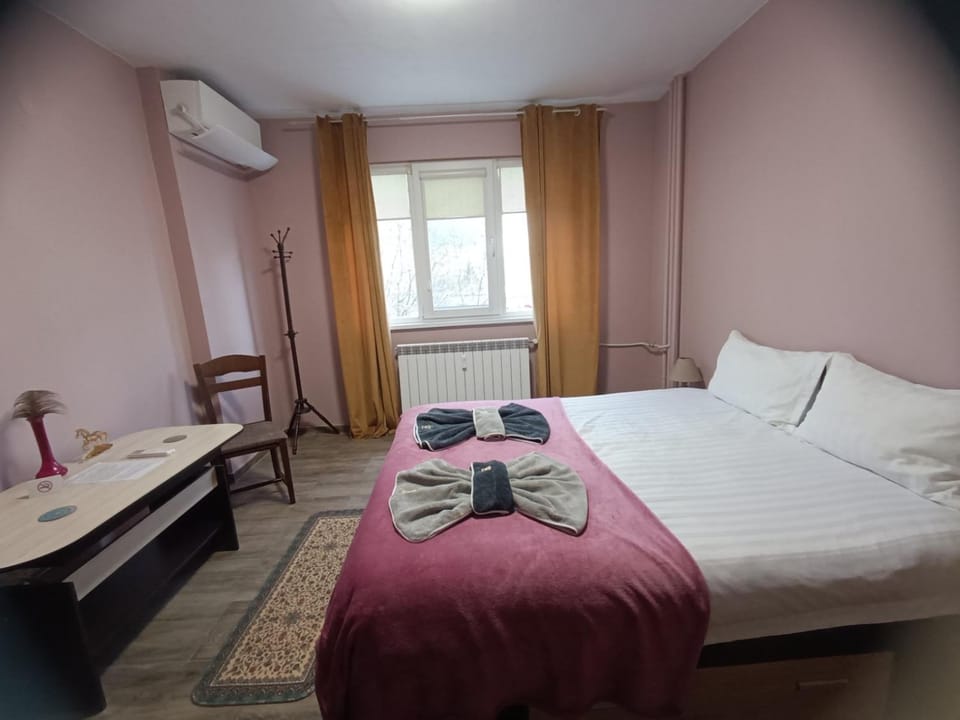 Bed, Photo of the whole room, Bedroom, towels, air conditioner