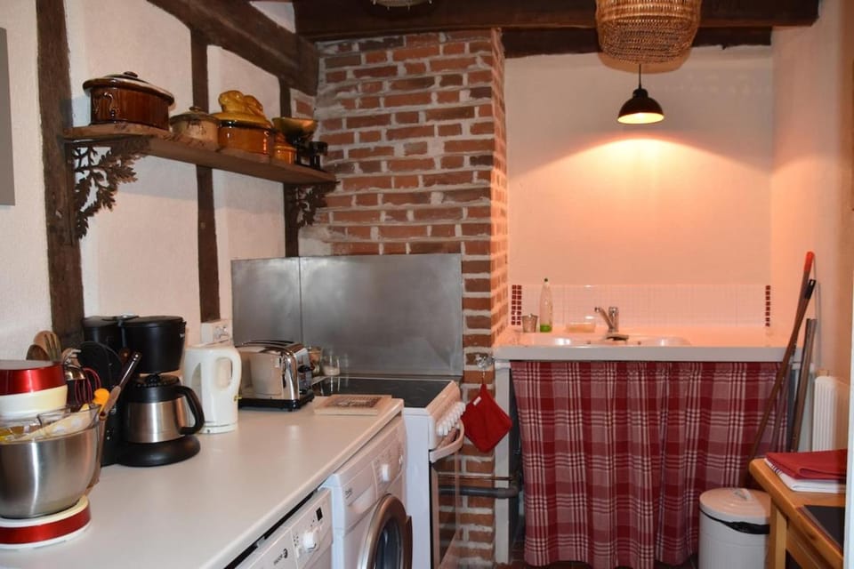 Kitchen or kitchenette, stove, toaster