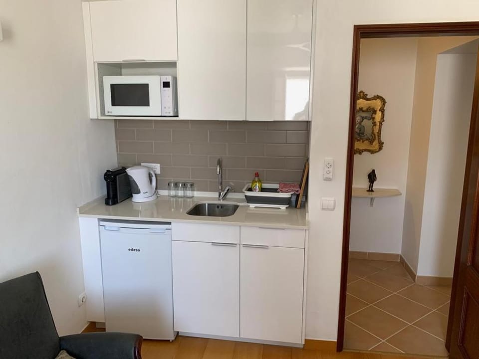 Kitchen or kitchenette, toaster