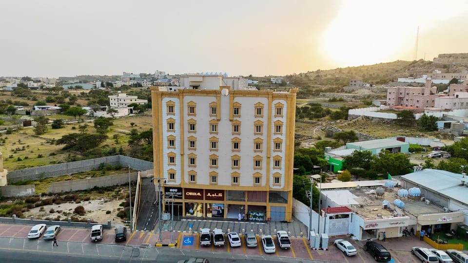 Property building, Day, Neighbourhood, Natural landscape, Bird's eye view, Street view, Location, Sunrise, Parking
