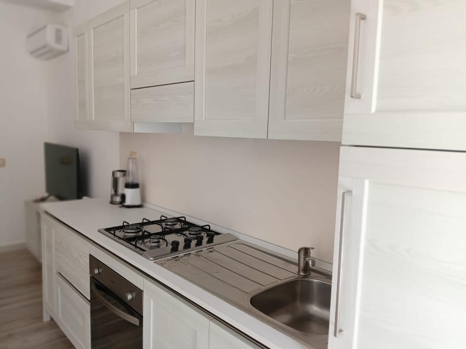 Kitchen or kitchenette, stove