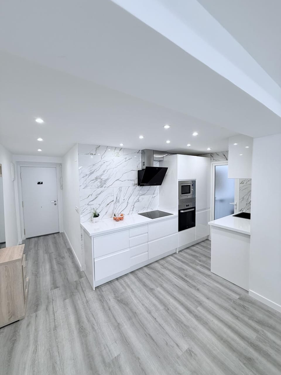 Kitchen or kitchenette, dishwasher, oven, stove