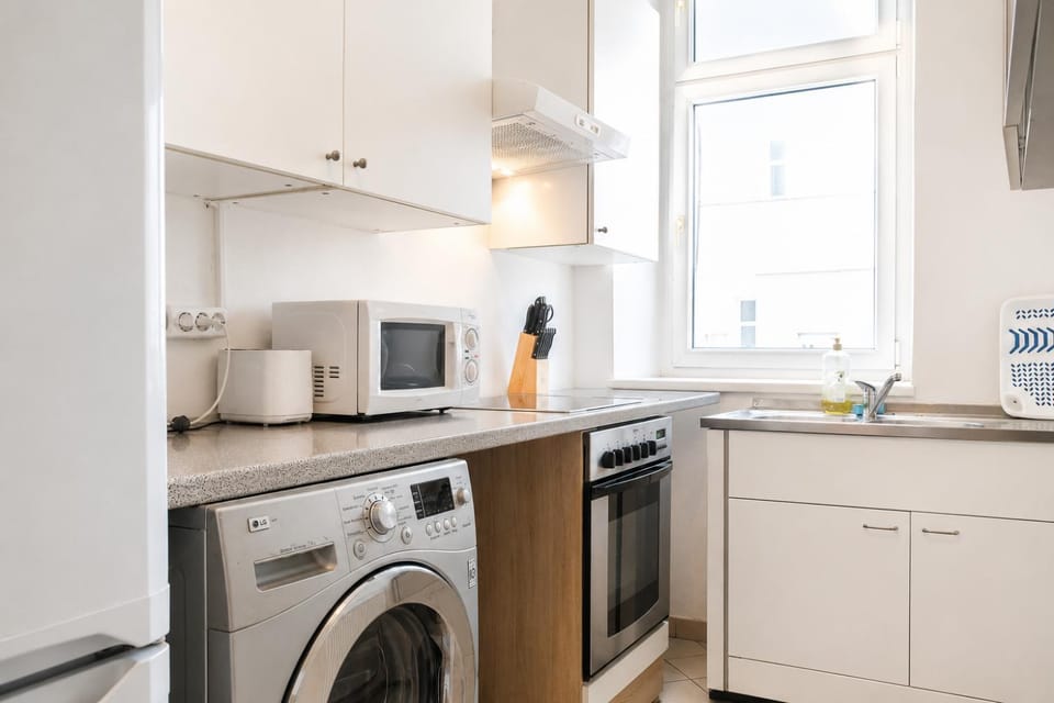 Kitchen or kitchenette, washing machine