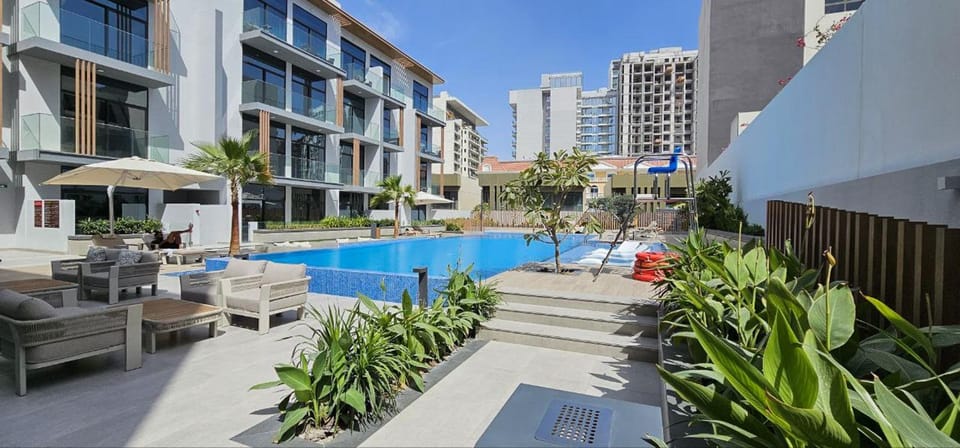 Luxury Stay JVC Modern 1BHK Pool & Gym Access Apartment in Dubai