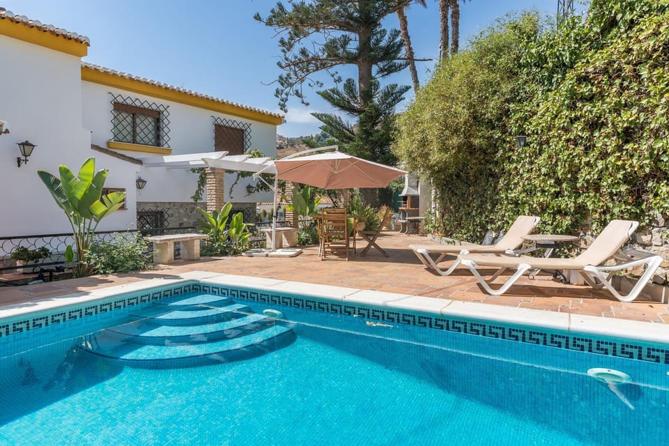Property building, Living room, Swimming pool