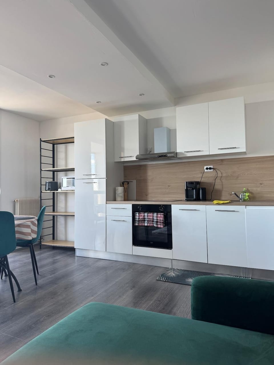 Kitchen or kitchenette, dishwasher, oven, stove