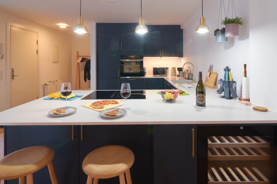 Kitchen or kitchenette, dishwasher, oven, stove