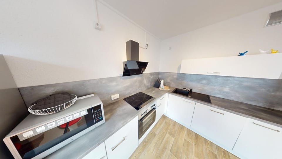 Kitchen or kitchenette, dishwasher, microwave, stove