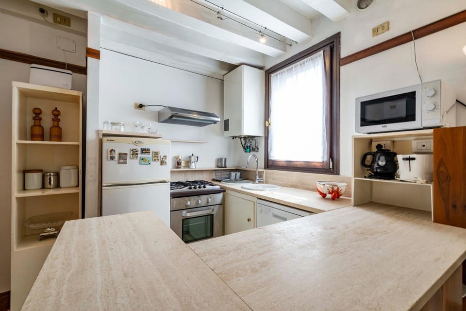 Kitchen or kitchenette, stove