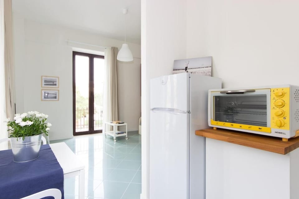 Kitchen or kitchenette, oven, stove
