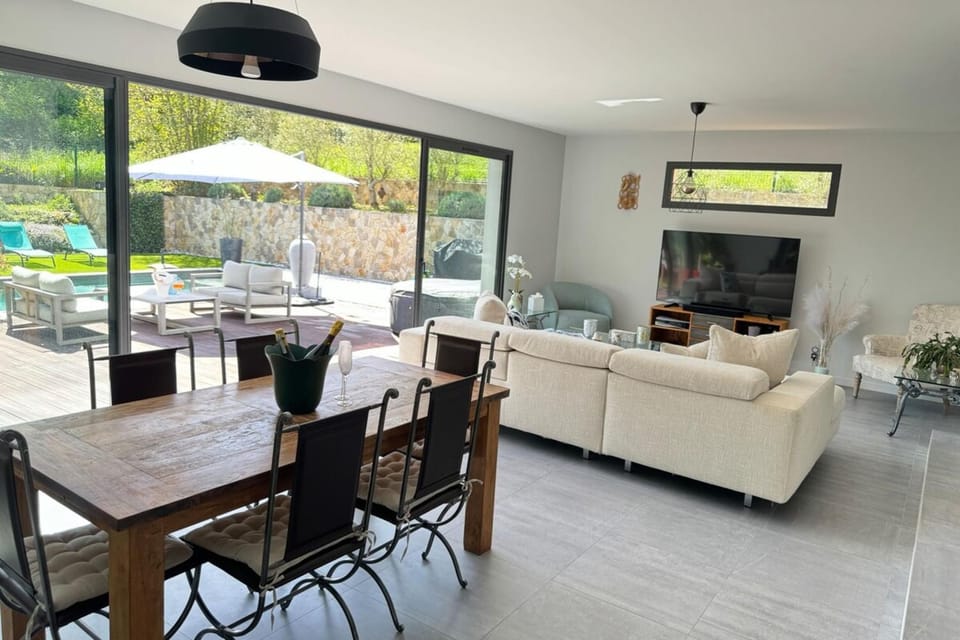 Patio, Day, View (from property/room), Living room, Seating area, Dining area, Garden view, Pool view, Swimming pool