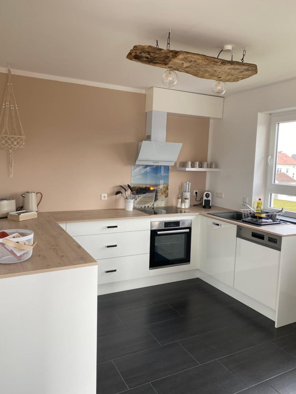 Kitchen or kitchenette, dishwasher, stove, toaster