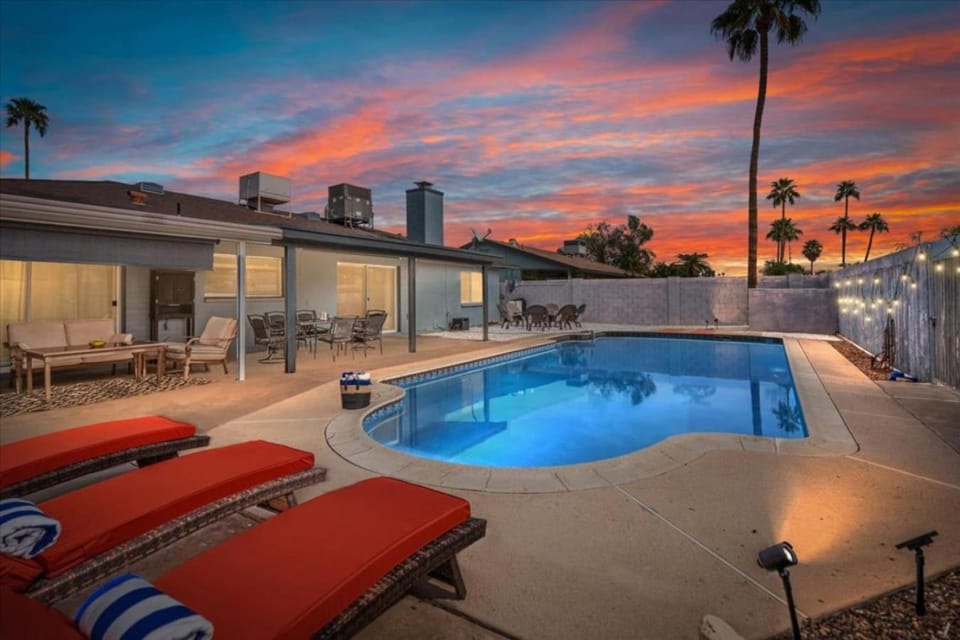 Property building, Patio, Natural landscape, Pool view, Swimming pool, Sunset, sunbed