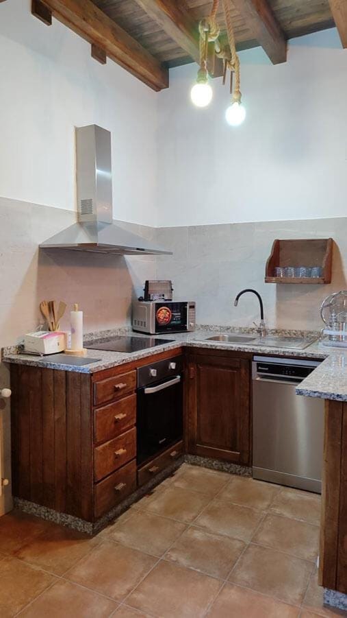 Kitchen or kitchenette, stove, toaster