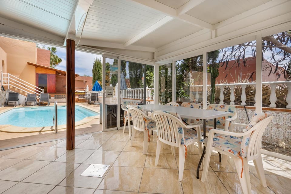 Property building, Living room, Swimming pool