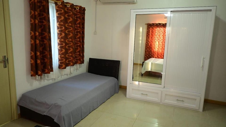 Bed, Bedroom, flat iron, towels, wardrobe
