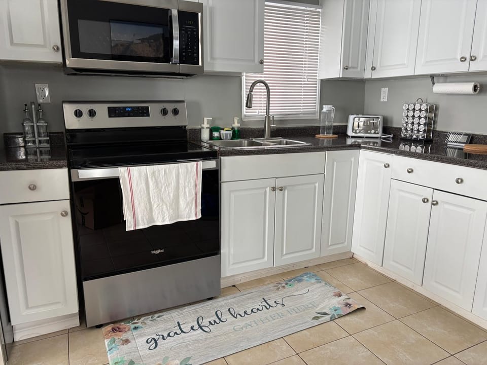 Kitchen or kitchenette, oven, stove, toaster