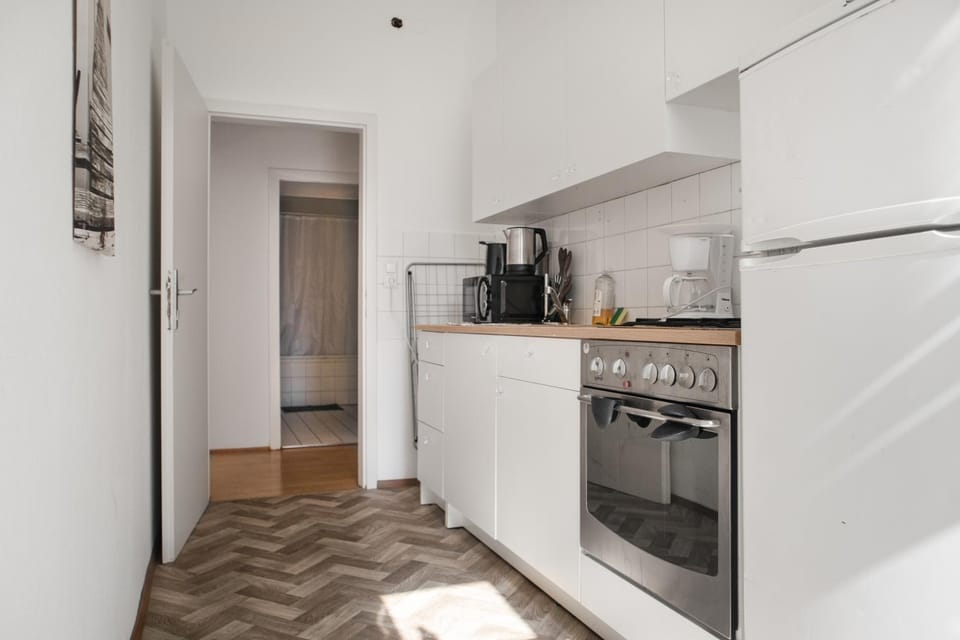 Kitchen or kitchenette, oven, stove, toaster