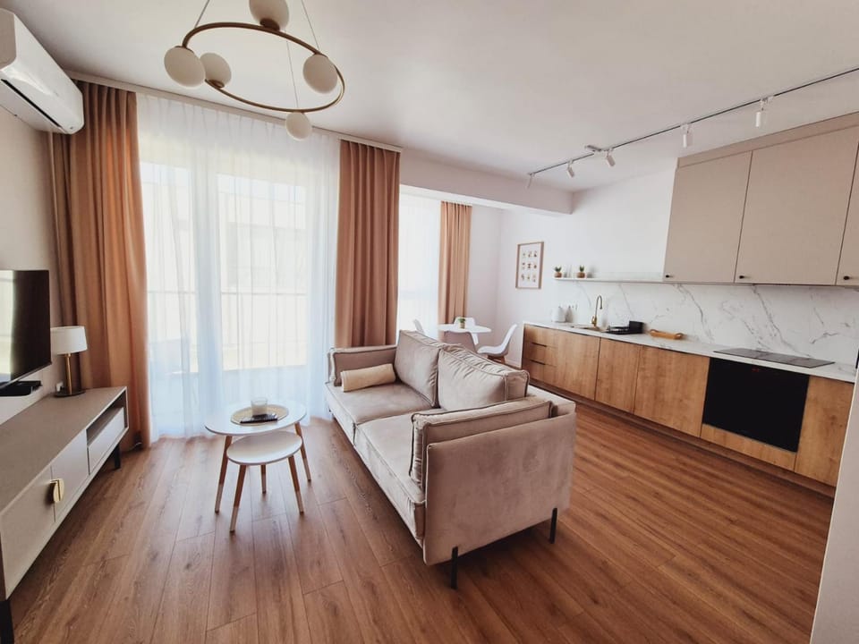 Kitchen or kitchenette, Living room, Seating area, Dining area, oven, stove, air conditioner