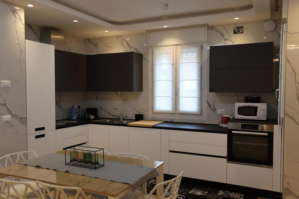 Kitchen or kitchenette, Dining area, dishwasher, oven, stove, toaster
