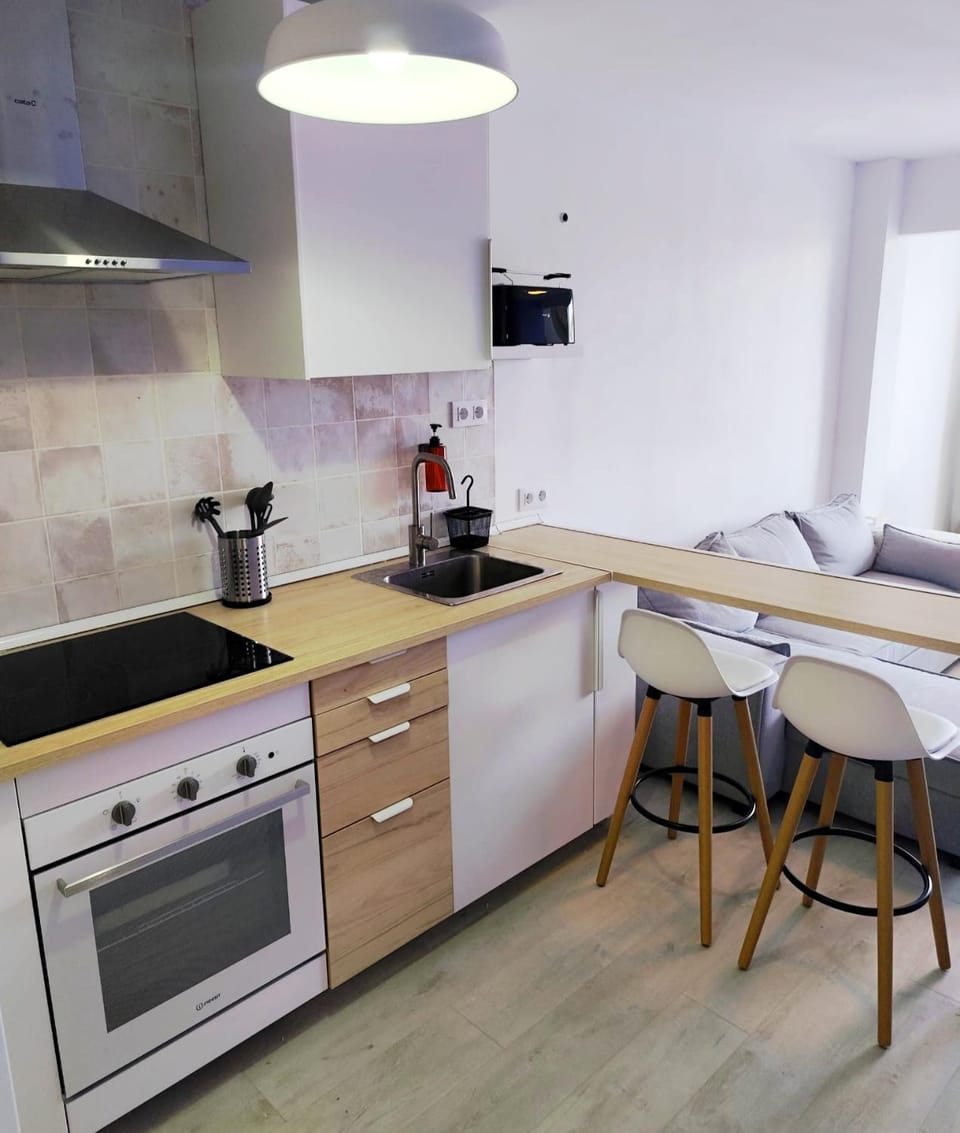 Kitchen or kitchenette, stove, toaster