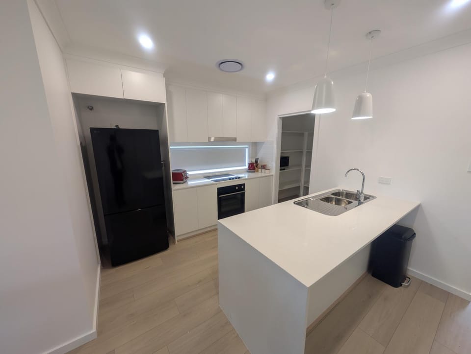 Kitchen or kitchenette, oven, stove