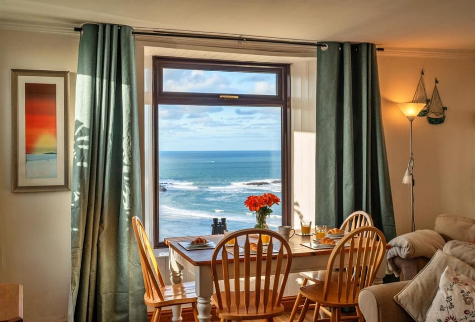 Natural landscape, Living room, Seating area, Dining area, Sea view