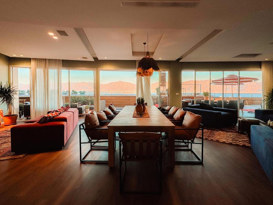 Natural landscape, Living room, Seating area, Sea view