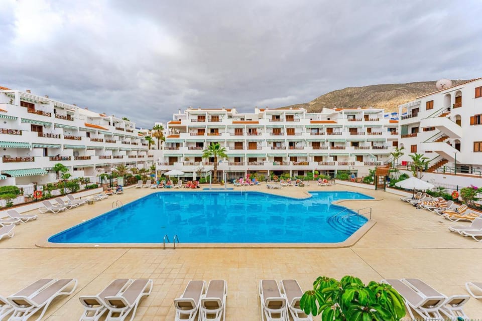Property building, Living room, Swimming pool
