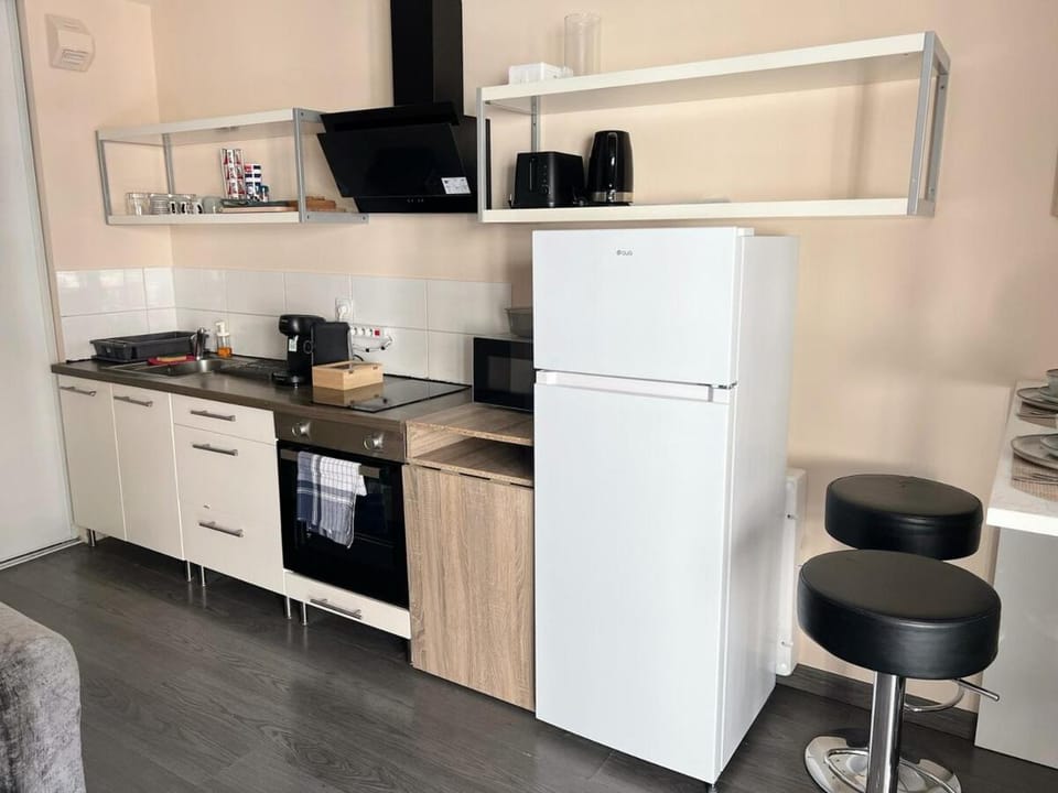 Kitchen or kitchenette, oven, stove, toaster