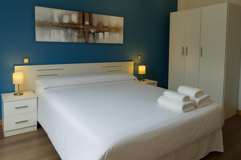 Bed, Photo of the whole room, Bedroom, towels, wardrobe