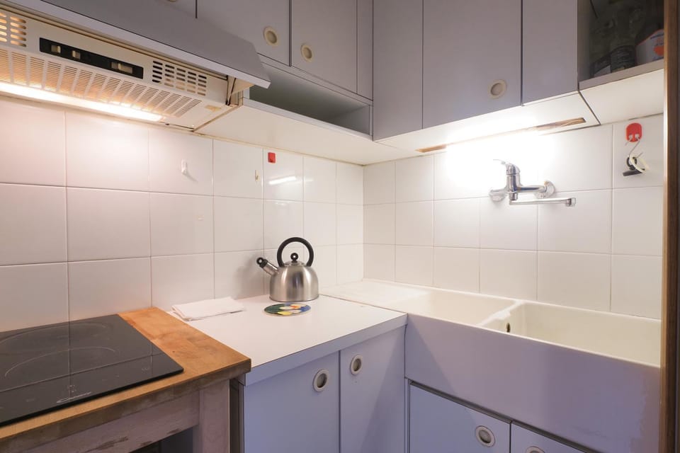 Kitchen or kitchenette, stove
