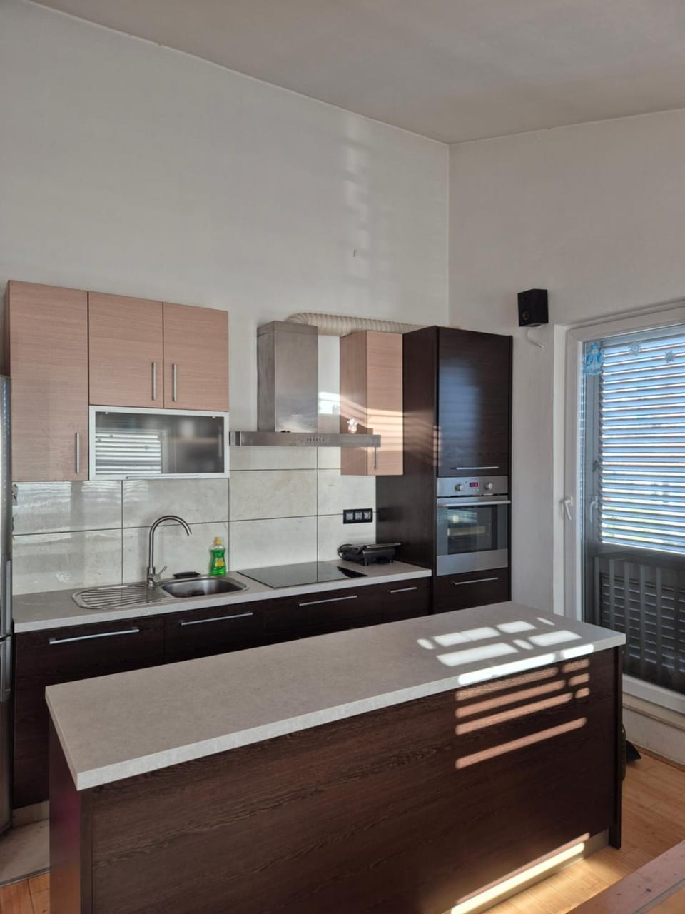 Kitchen or kitchenette, dishwasher, oven, stove