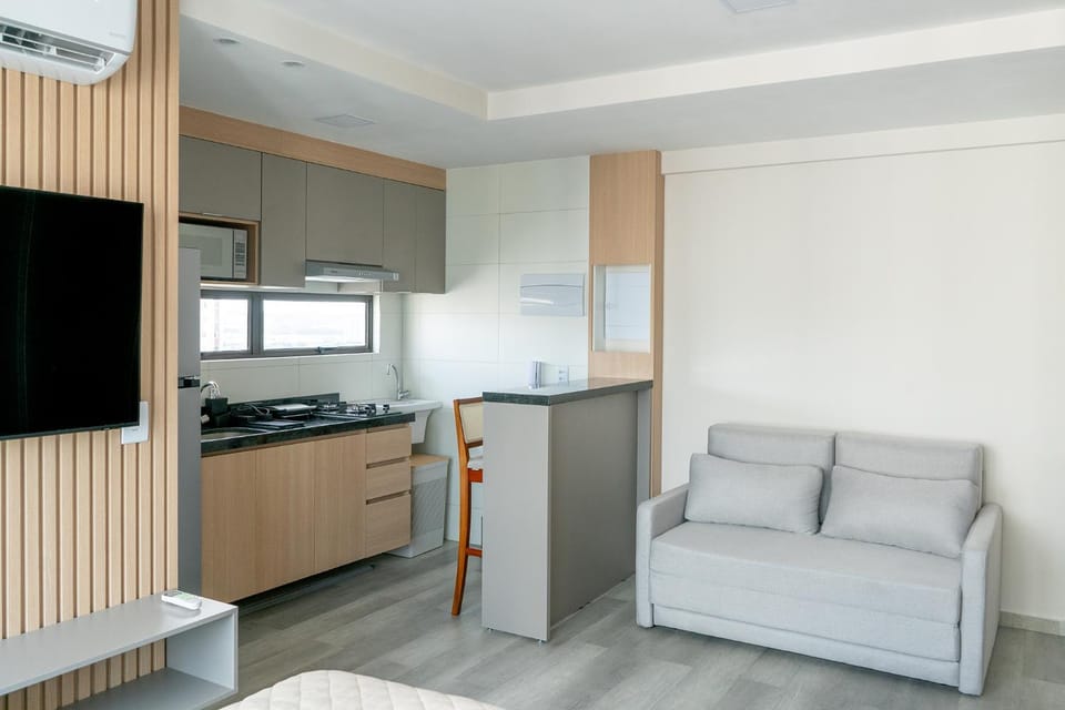 TV and multimedia, Kitchen or kitchenette, Seating area, oven, stove