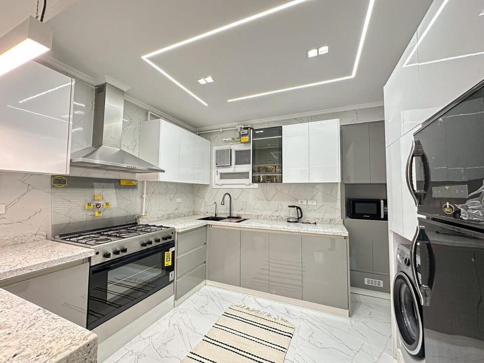 Kitchen or kitchenette, oven, stove