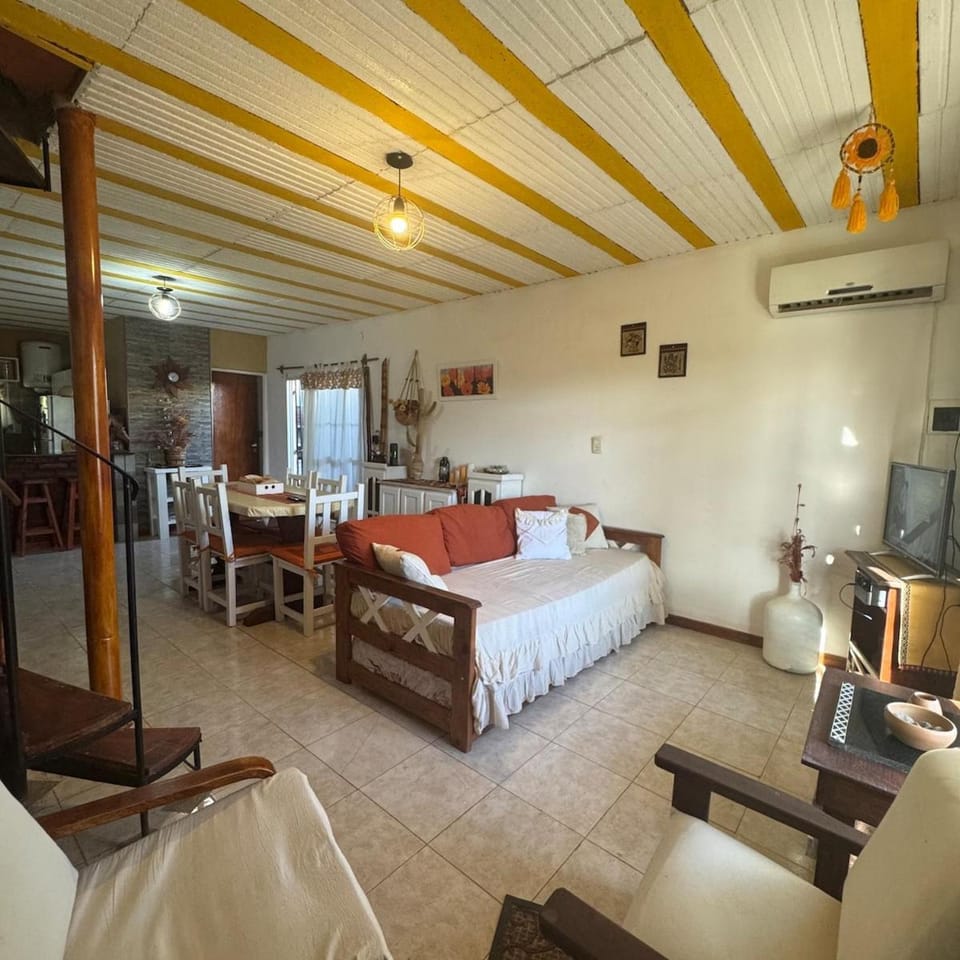 Communal lounge/ TV room, Bed, TV and multimedia, Living room, Photo of the whole room, Seating area, Dining area, Evening entertainment, Bedroom, air conditioner