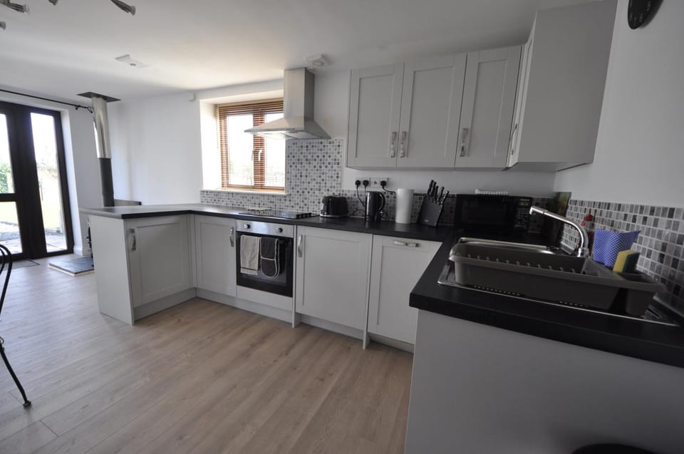 Kitchen or kitchenette, stove