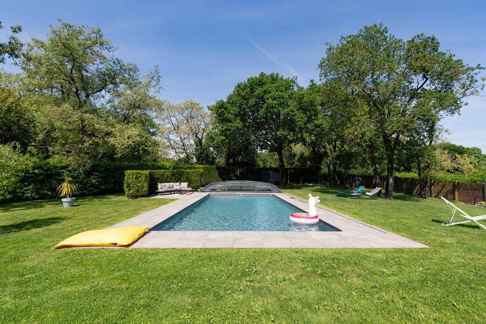 Property building, Living room, Swimming pool