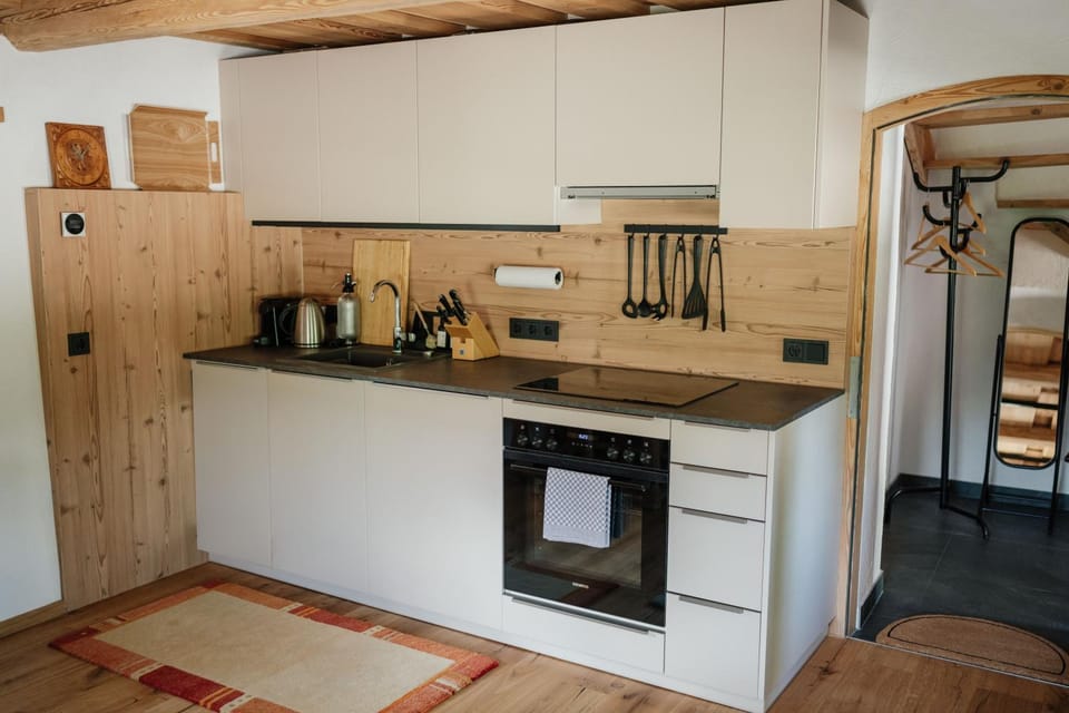 Kitchen or kitchenette, stove, kitchen