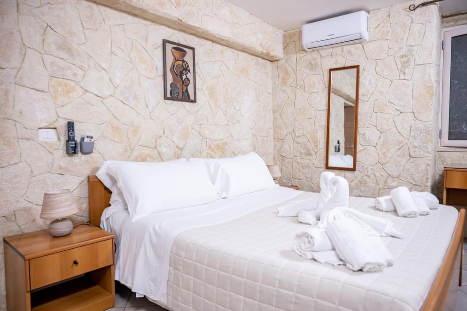 Bed, Photo of the whole room, Bedroom, towels, air conditioner
