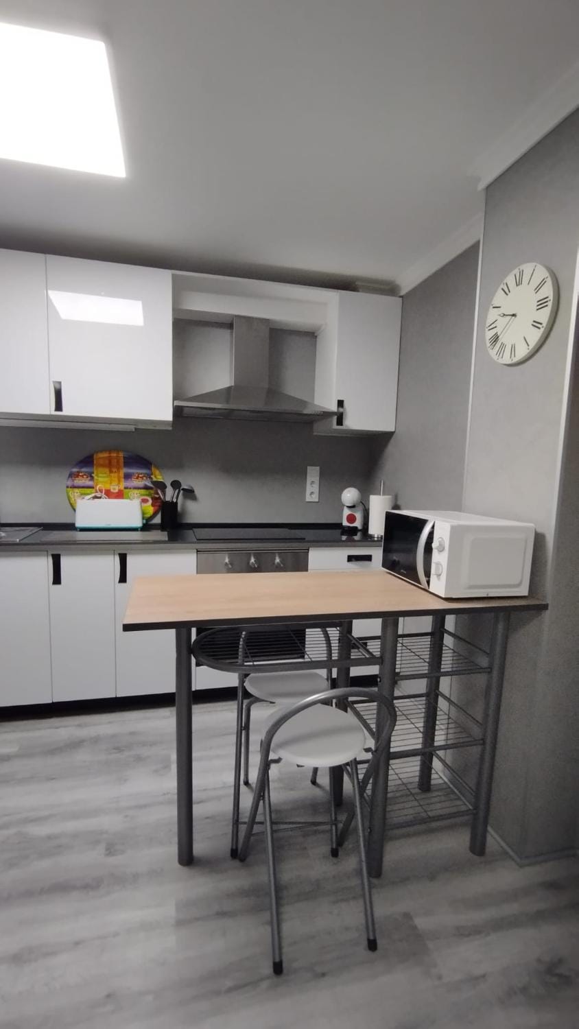 Kitchen or kitchenette, stove, toaster