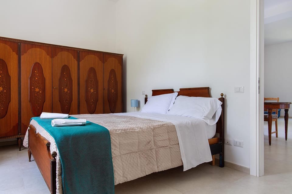 Bed, Photo of the whole room, Bedroom, towels, wardrobe