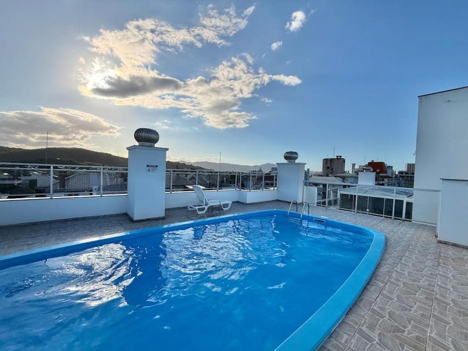 Apê Tropical | Open Shopping I Piscina I Garagem Apartment in Florianopolis