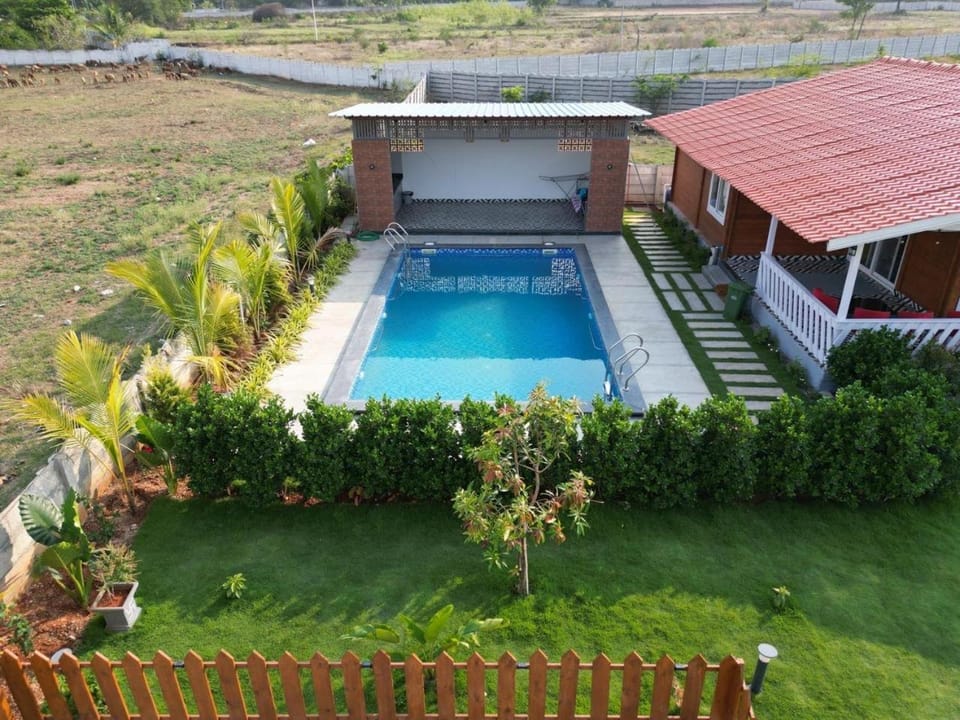 Kuku farm stay 3 bedroom wooden cottage with private pool at Moinabad Chalet in Hyderabad