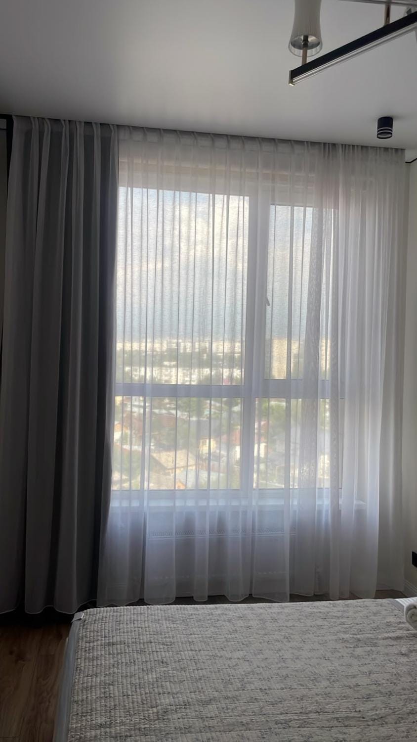 Двухкомнатная студия с панорамным видом на горы Apartment in Almaty