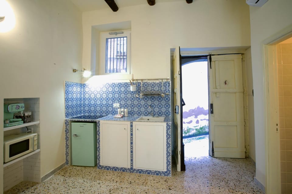Kitchen or kitchenette, stove